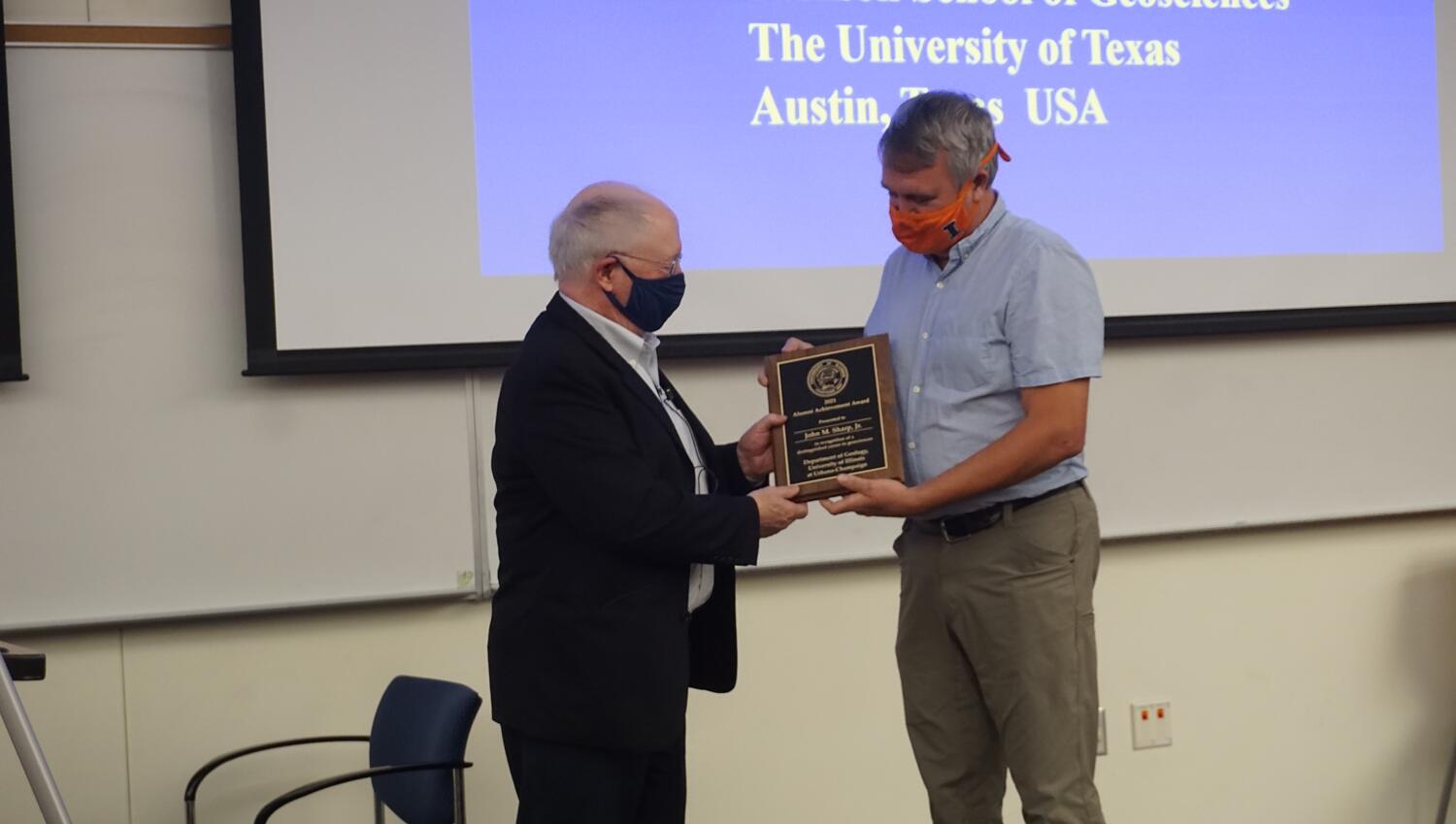 Dr. Sharp receiving his award